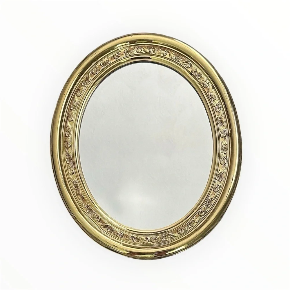 beautiful vintage gold plastic oval mirror